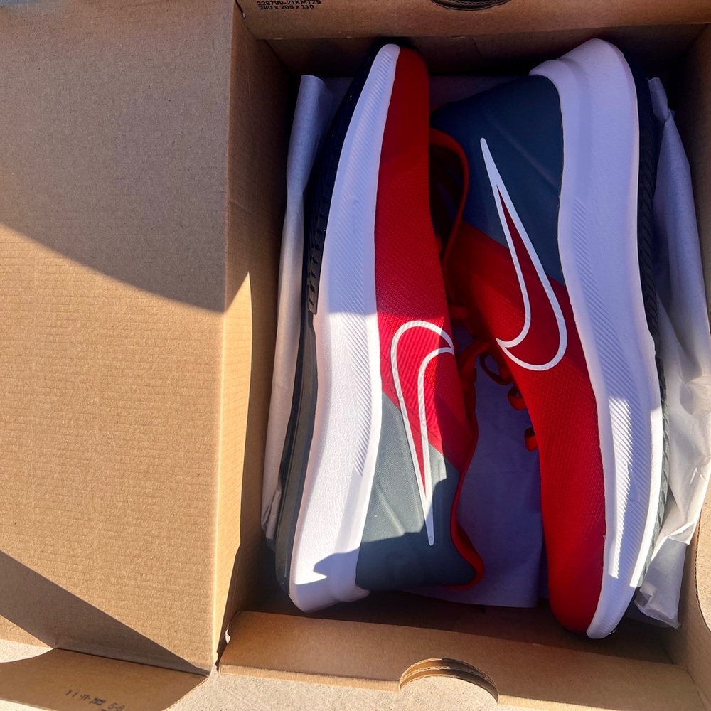 Big boys Nike red sneakers
